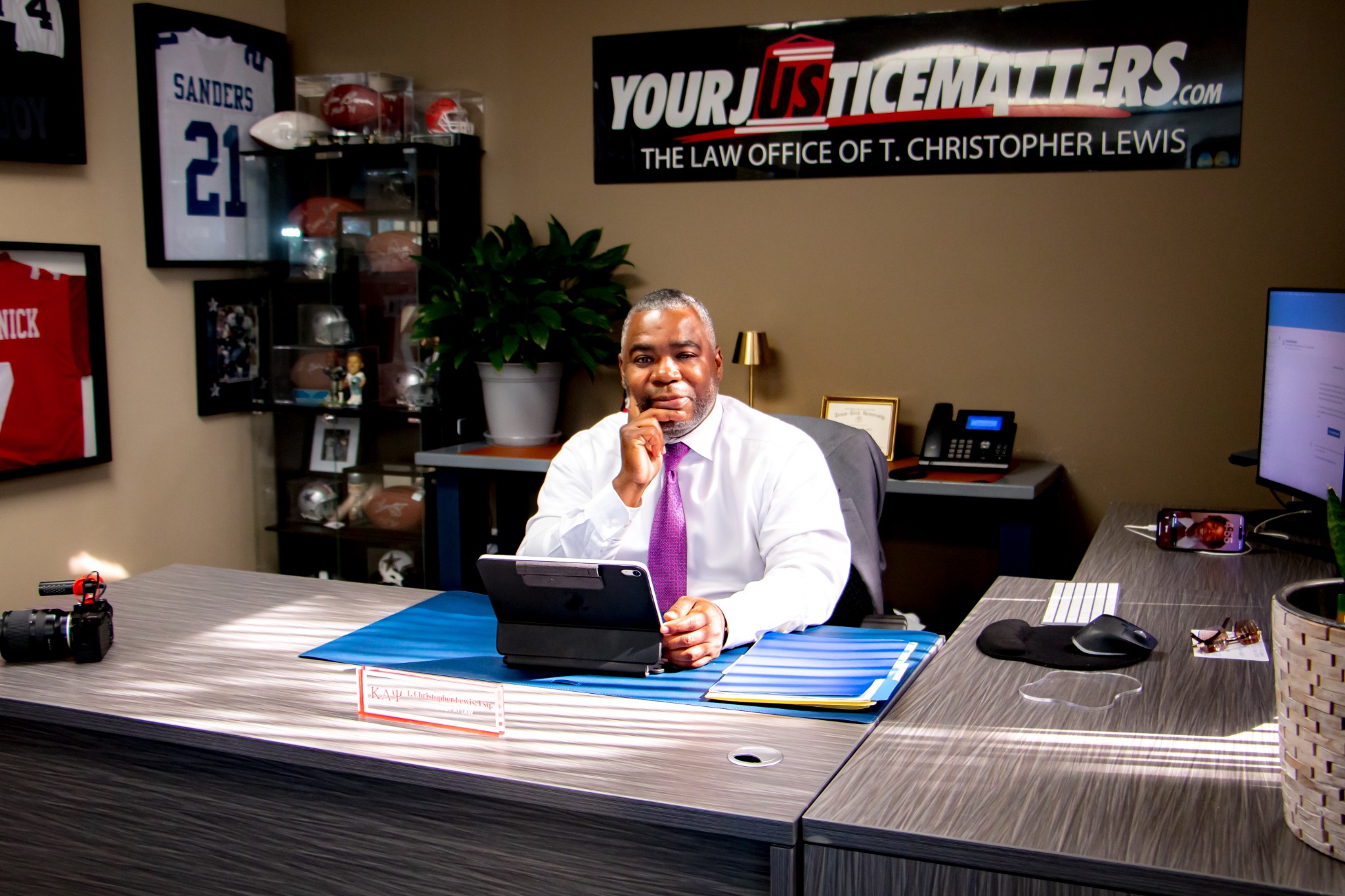 T. Christopher Lewis reviewing a client matter